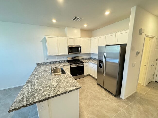 Building Photo - Charming 3-Bedroom Home with Open Layout, Balcony & Modern Finishes!