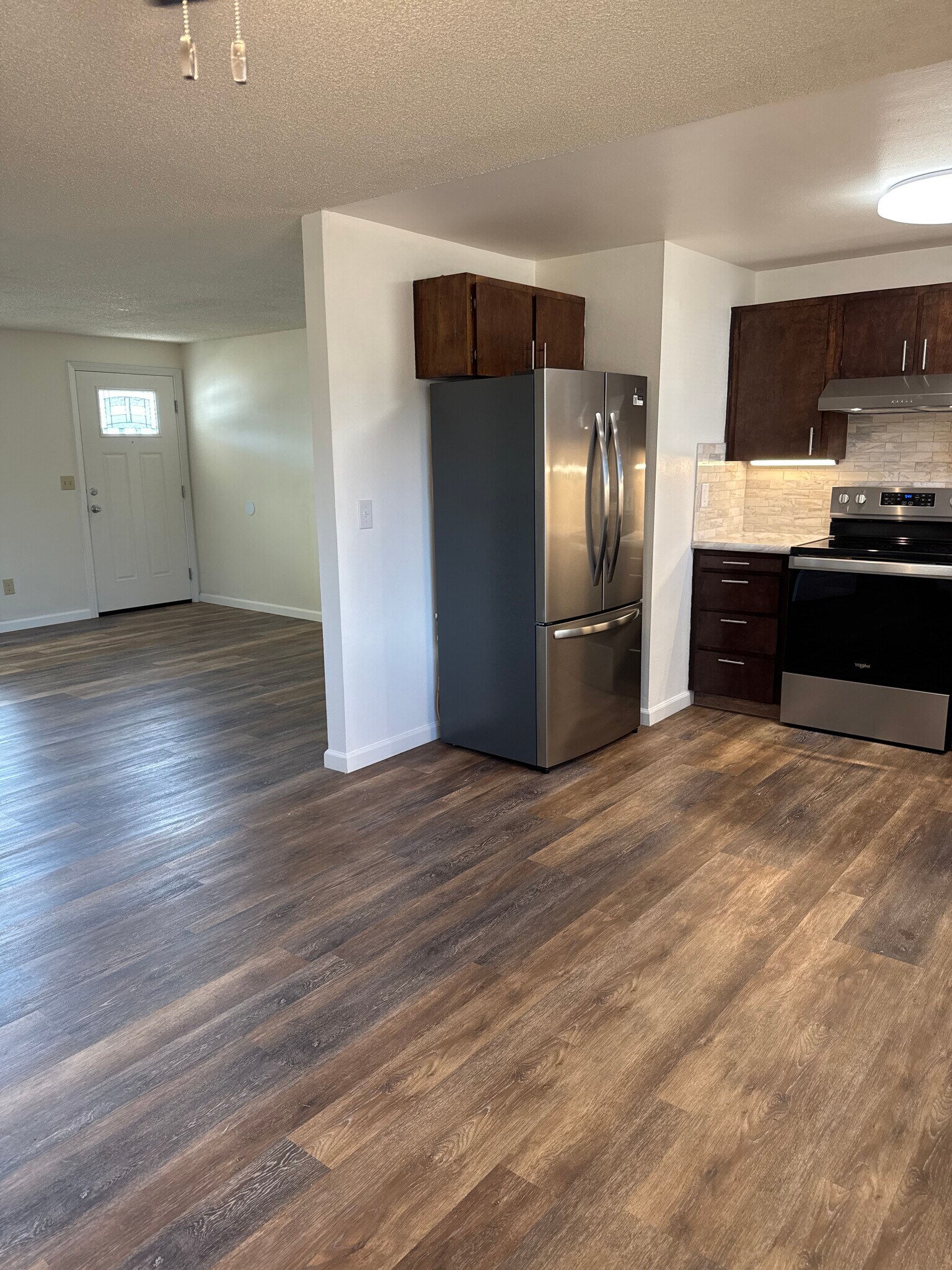 In kitchen looking into living room - 15320 NE 31st St