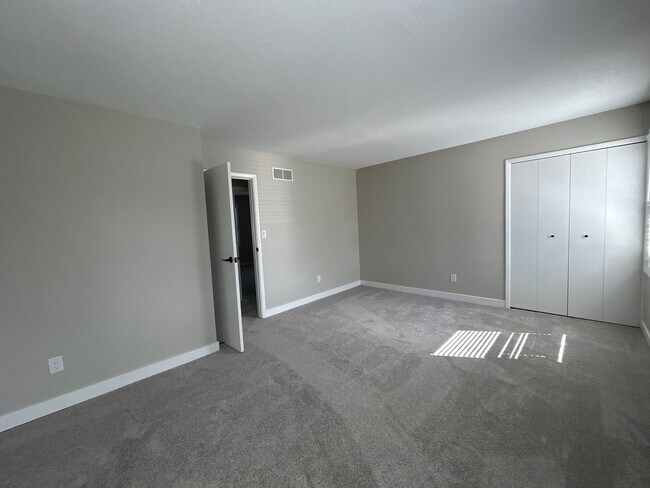 Building Photo - Beautifully Redone 3-Bedroom, 1.5-Bathroom Condo with Attached Garage – $1,725/Month (Lawn Care &...