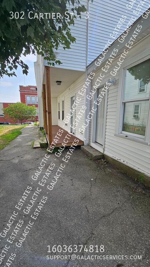 Building Photo - 302 Cartier St