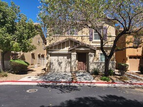 Building Photo - Sleek 2 story home with tile in most living areas and upgraded kitchen.
