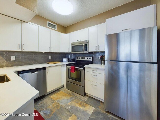 Building Photo - 8401 N Atlantic Ave