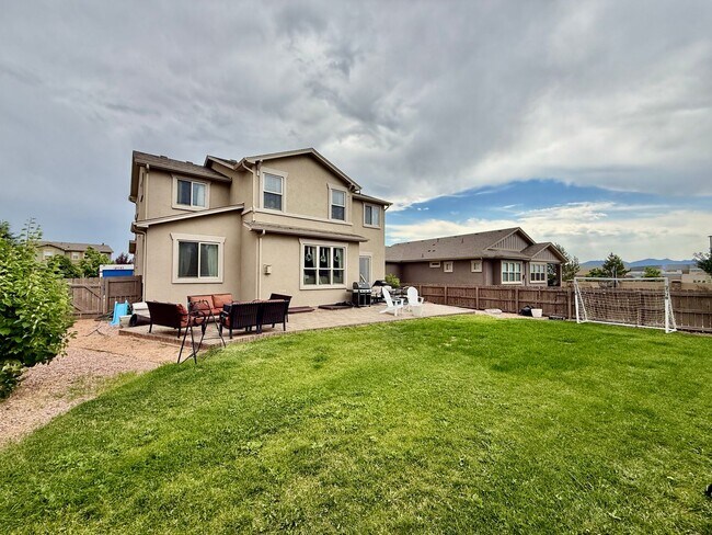 Building Photo - Spacious & Stylish 5-Bedroom Home in Wolf ...