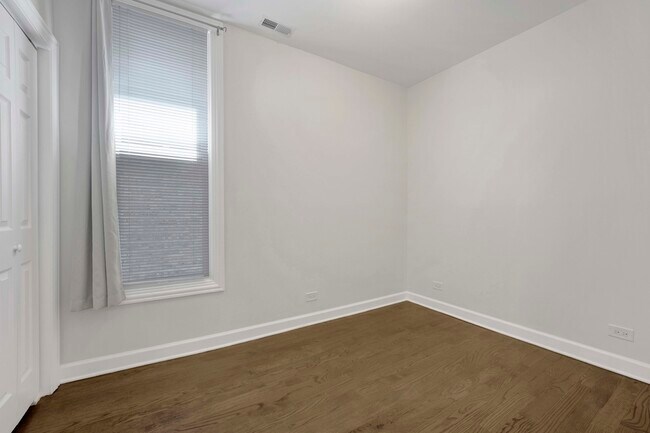 Building Photo - 1821 N Tripp Ave