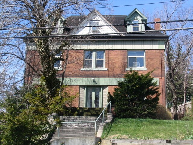 Stately curb appearance and setting gives exceptional privacy and security - 5601 Wilkins Ave