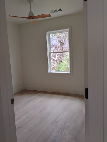 Bedroom 2 with large closet - 227 N Rocksprings St