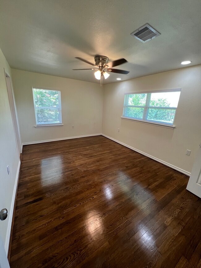 Master bedroom with direct access into bathroom. - 6015 Heffernan St