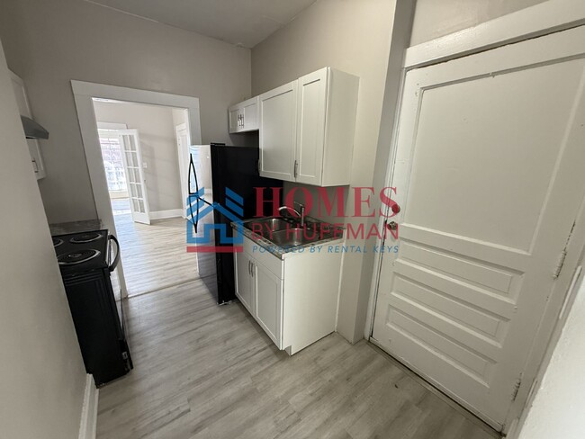 Building Photo - One Bedroom Upstairs Apartment | Available...