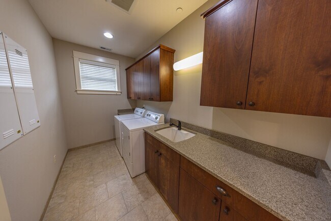 Building Photo - 2 Creeks Condominiums - Gated Community on...