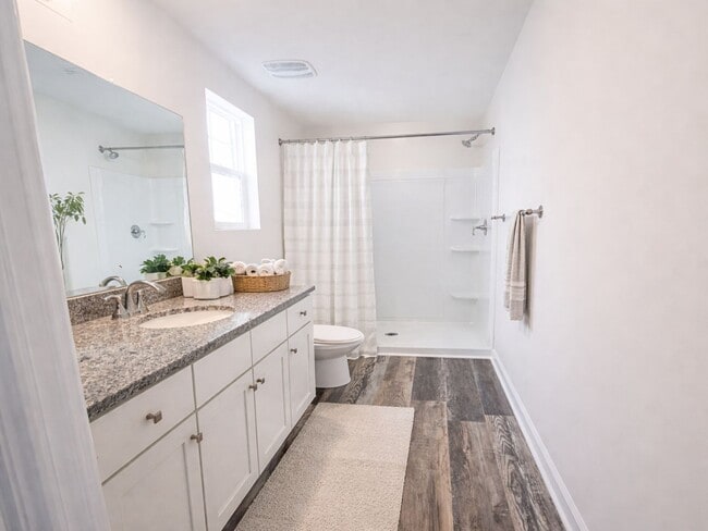 Building Photo - FIRST MONTH FREE - 3BR Townhome • Full Kitchen • Garage + Driveway