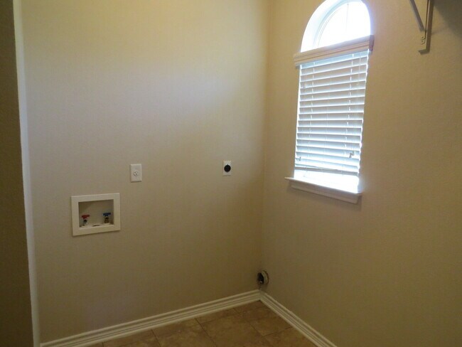 Building Photo - "Spacious 4-Bed Oasis in Killeen with Granite Touches & Cozy Fireplace!"