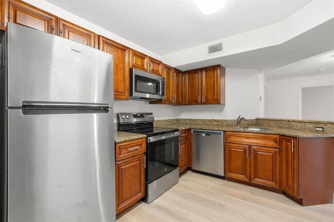 Building Photo - 8851 Wiles Rd