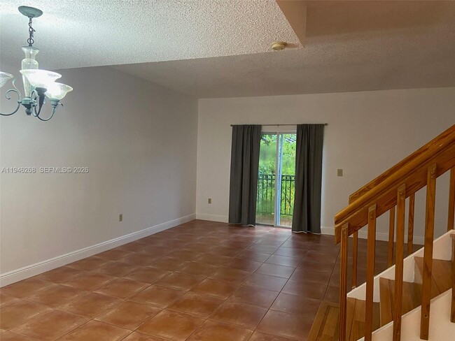 Building Photo - 10030 Hammocks Blvd