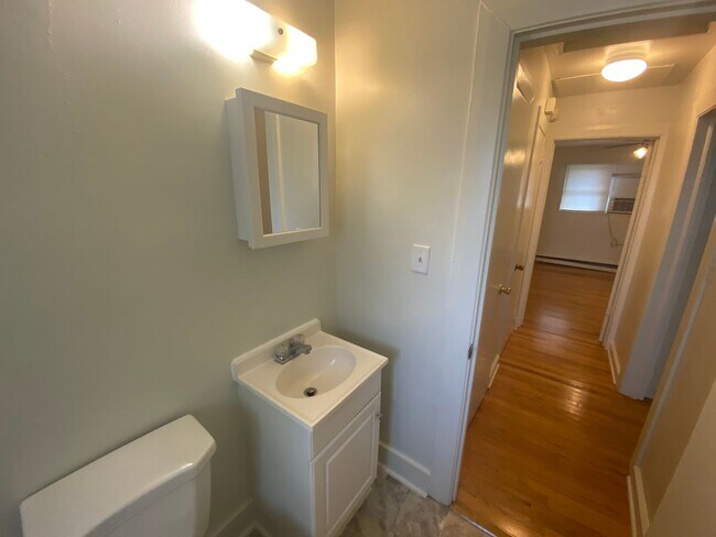 Building Photo - Private carport, in-unit laundry, and the Lakewood strip right outside your door.