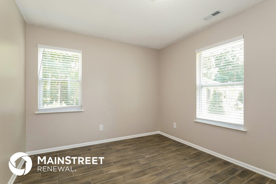 Building Photo - 6061 Acadian Woods Dr
