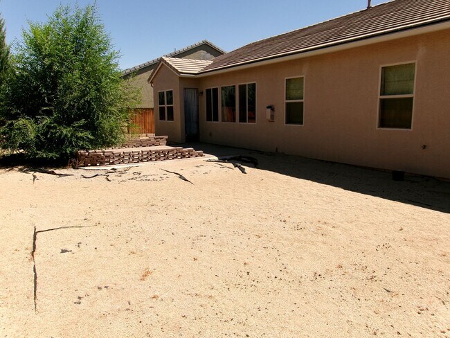 Building Photo - Spacious home located in gated community.