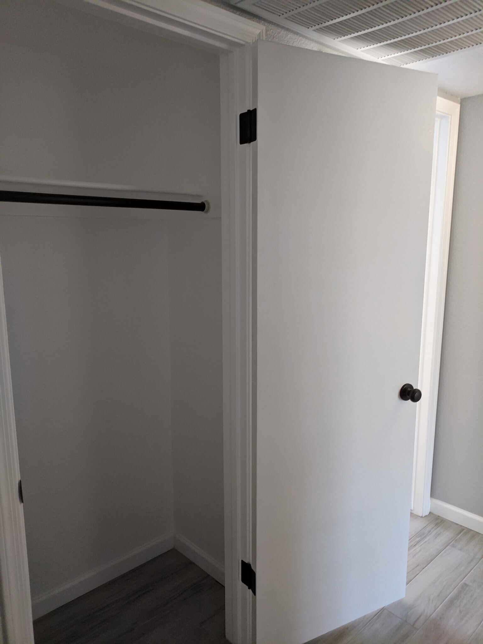 Hall Closet / opened - 14101 N 78th Dr