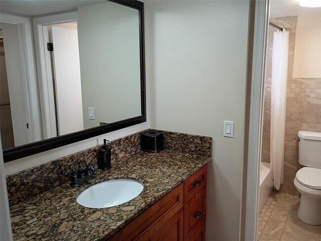 Building Photo - Stylish Remodeled Condo with Scenic Water ...