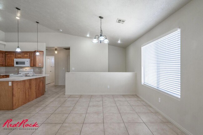 Building Photo - Fresh Carpet! Spacious 5-Bedroom Townhome