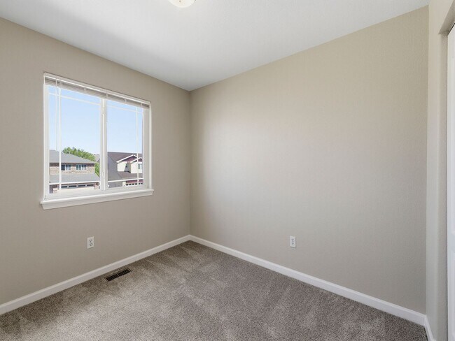 Building Photo - Recently Refreshed 3 Bed, 2.5 Bath Duplex with Fenced Yard — Available Now in Evans, CO!