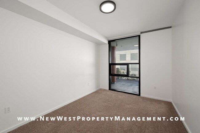 Building Photo - Modern East Village 1-Bedroom at Icon! Sma...