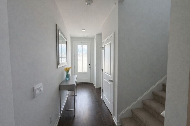 Building Photo - Highly Desirable 4 Bedroom Home with Serene Cul-de-Sac Living in Watergrass Community