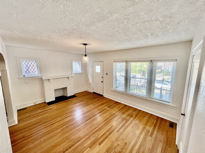 Family Room w/Decorative Fireplace - 7248 Amherst Ave