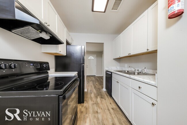 Building Photo - Come view this adorable, move-in ready home