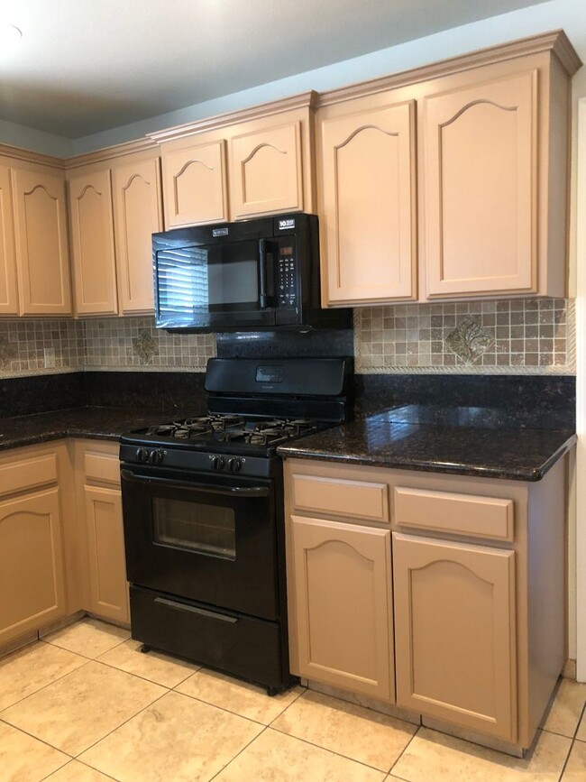 Building Photo - 2 Weeks Free! 4 Bedroom, 2.5 Bathroom Ston...