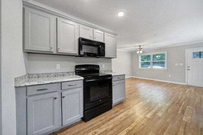Building Photo - Beautiful Brick Home With Large Driveway