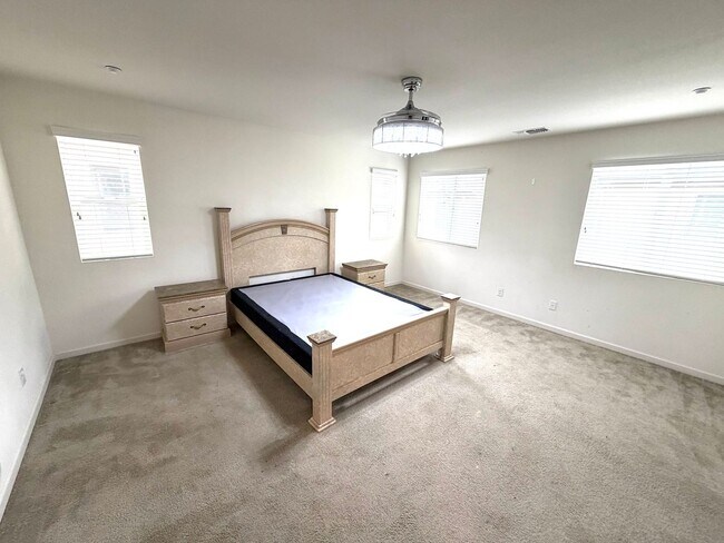 Building Photo - Spacious 5BR + Loft in Hamptons Village – Studio Suite, New HVAC, EV Charging