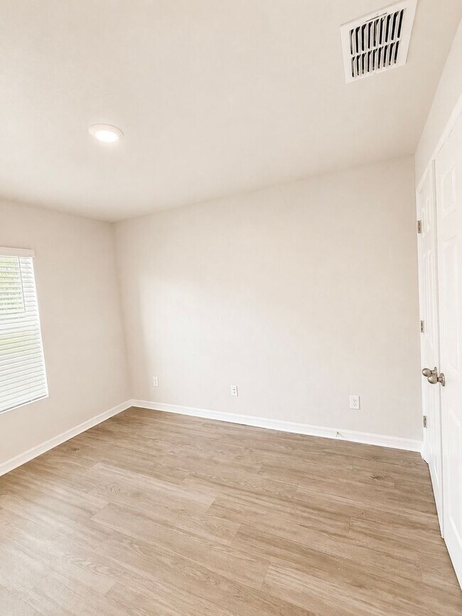 Building Photo - Move in Special + Pets Allowed