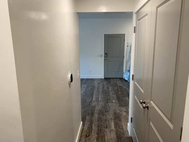 Hallway from bedrooms - 875 S Depot St