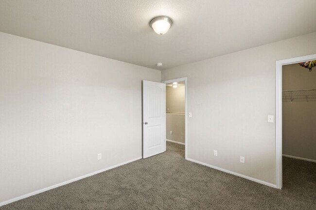 Building Photo - Spacious 4-Bedroom Home with Loft, Solar & Fenced Backyard