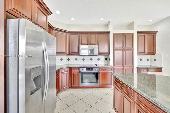 Building Photo - Southwest 51st Street, Miramar, FL 33027 - 5 BR 3.5 BA single-family home