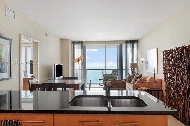 Building Photo - 6799 Collins Ave