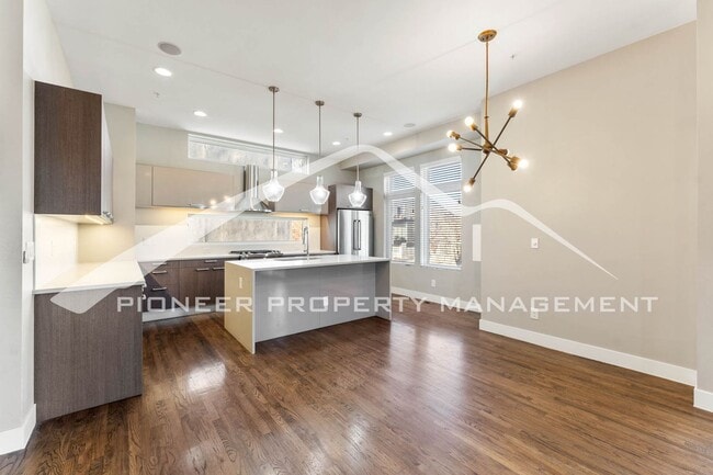 Building Photo - Fantastic Townhome with A Roof Top Patio, Attached Garage, and Central AC!