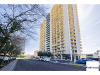 Building Photo - Check Out This Stunning 2/2 Luxury Condo Offering Panoramic Skyline Views And Sophisticated Modern F