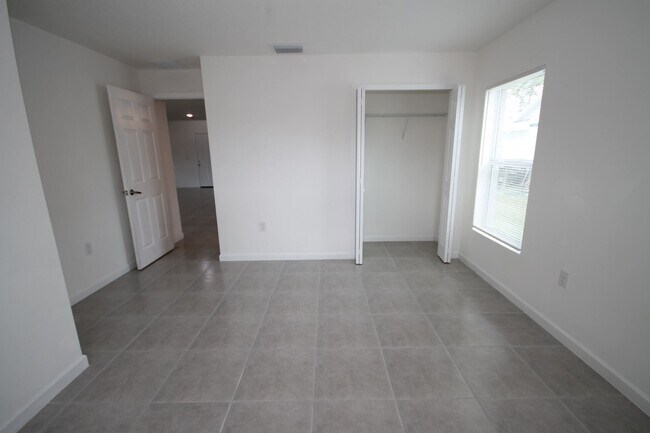 Building Photo - Stunning 4BR/2BA Palm Bay Retreat with Modern Upgrades & Oversized Lot!!