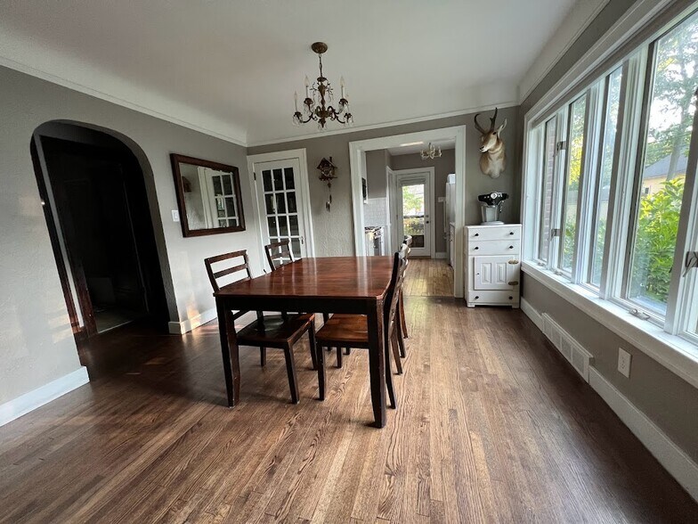 dining room + archway to downstairs bedrooms + bathroom - 1334 Northway St