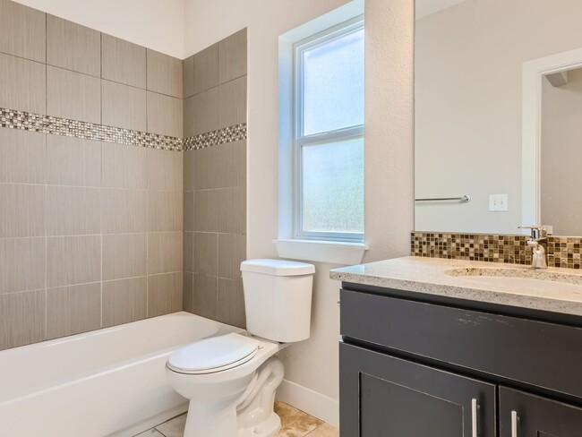 Building Photo - COMING IN  May!!!!!!  Spacious 4 Bedroom, ...