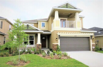 Building Photo - 8828 Tropical Palm Dr
