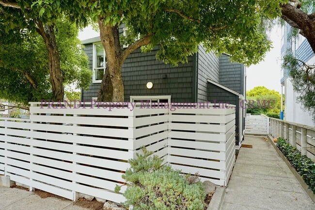 Building Photo - Wood burning fireplace in this updated 2 b...