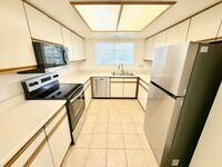 Building Photo - Freshly Updated 2-Bedroom Condo In The Mes...