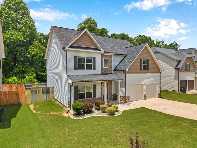 Building Photo - Spacious 4BR Home with Fenced Yard & Community Pool
