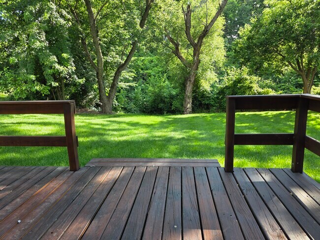 Park-like setting in back - 5205 N Montclair Ave