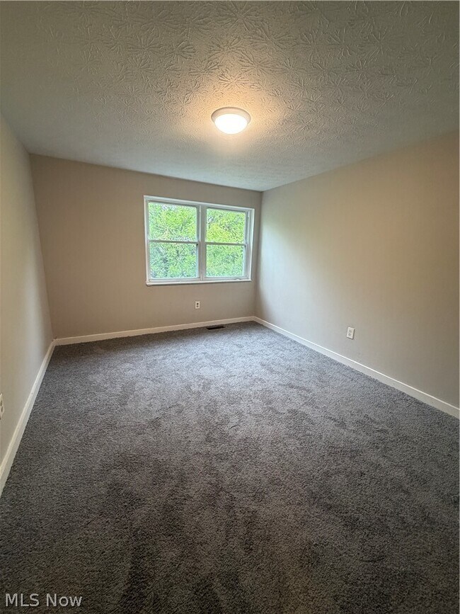 Building Photo - 9409 Manor Ave