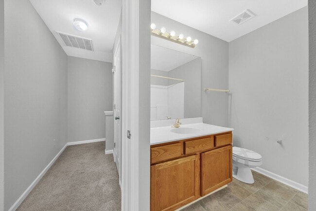 Building Photo - Two-story Condominium with Easy Highway Ac...