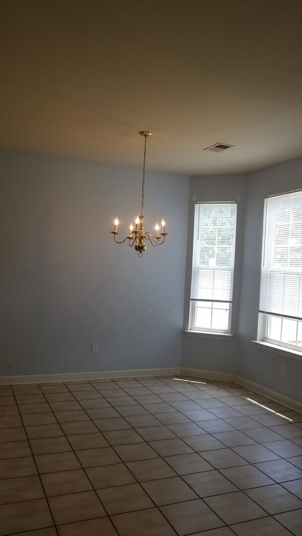 Building Photo - Lovely 4 BR/2.5 BA in Avalon -  FRESH paint, BRAND NEW flooring, FOUR bedrooms and a FENCED yard!!