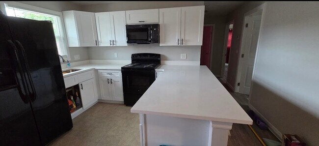 Building Photo - 5639 Fourth Ave